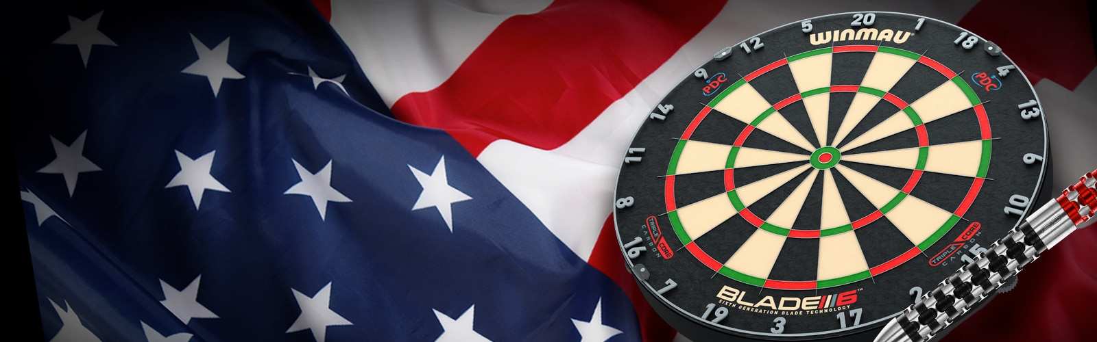 A Winmau Blade dartboard in front of the American flag